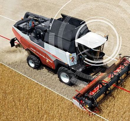Boosting grain harvester performance